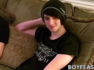 Young men kiss before the stage sloppy oral and handy time