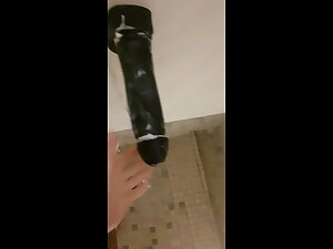 Sneakily fucking my largest dildo with reference to public gym shower