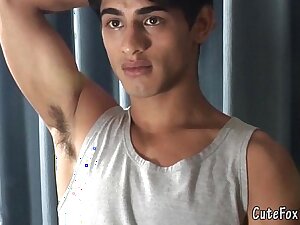 Fresh-faced well-pleased boy charming the cam