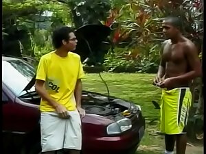 Smart curly dude Wellington had disconnected spark plugs in advance and came to help his  black-a-vised friend  Lindberg Sisso to fix his car